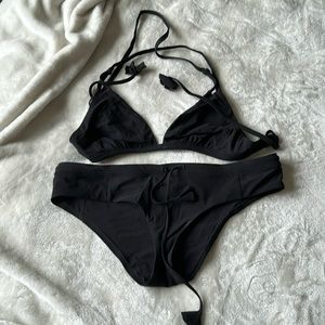 Lululemon black bikini with signature flower tassels sz M